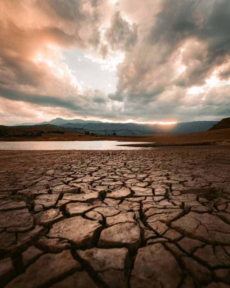 (image of a cloudy day or some dry, cracked earth).jfif